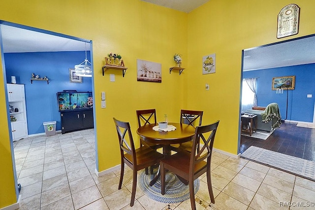 dining room with tile patterned floors