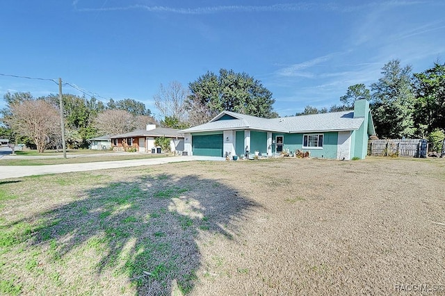 single story home with a garage