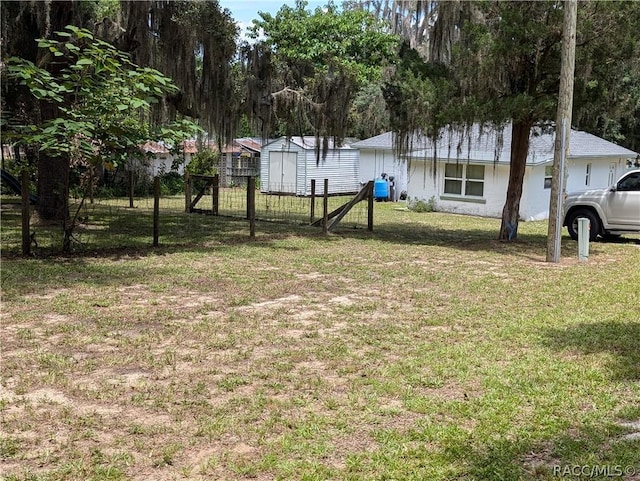 view of yard featuring fence