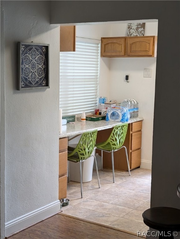 kitchen with light wood-type flooring