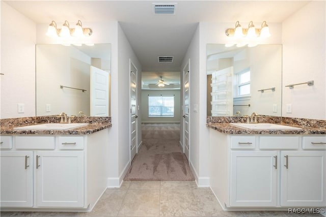 bathroom with vanity, plenty of natural light, and ceiling fan