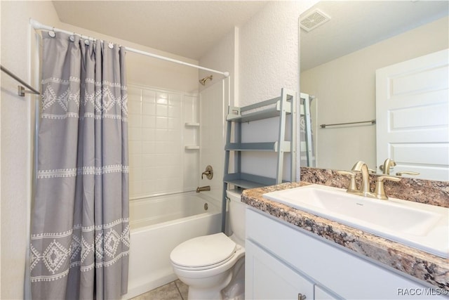 full bathroom featuring tile patterned floors, vanity, toilet, and shower / bath combo