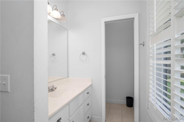 9093 E Pinehurst Ct, Inverness, FL 34450 - bathroom with vanity and tile patterned flooring