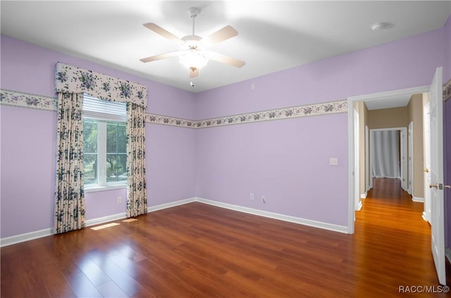9093 E Pinehurst Ct, Inverness, FL 34450 - unfurnished room featuring wood finished floors, a ceiling fan, and a smoke detector