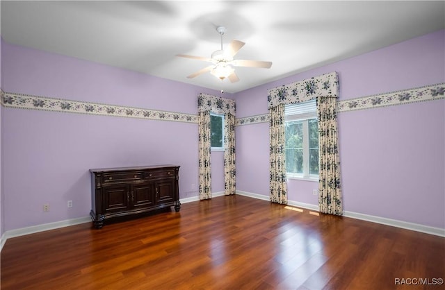 9093 E Pinehurst Ct, Inverness, FL 34450 - spare room featuring ceiling fan and wood finished floors