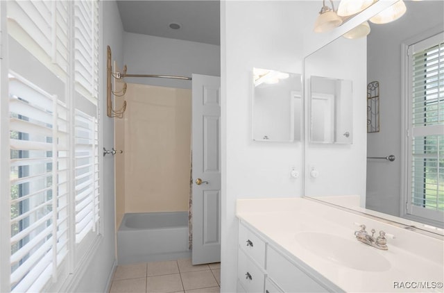 9093 E Pinehurst Ct, Inverness, FL 34450 - full bathroom featuring vanity, tile patterned flooring, shower / bath combination, and healthy amount of natural light