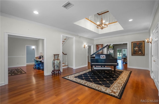 9093 E Pinehurst Ct, Inverness, FL 34450 - foyer with stairs, wood finished floors, crown molding, a chandelier, and recessed lighting