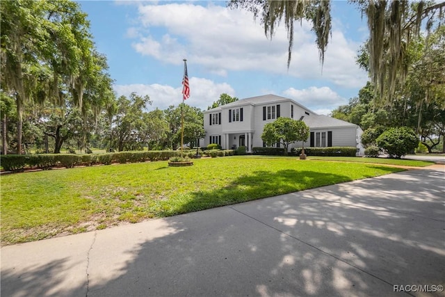 9093 E Pinehurst Ct, Inverness, FL 34450 - view of front of home with a front lawn