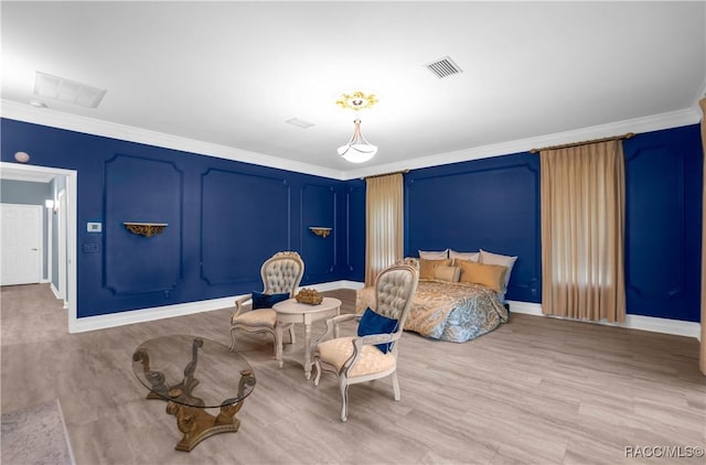 9093 E Pinehurst Ct, Inverness, FL 34450 - bedroom with crown molding and wood finished floors