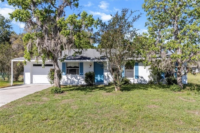 813 Constitution Blvd, Inverness, FL 34453 - ranch-style house featuring a front yard, driveway, stucco siding, and an attached garage