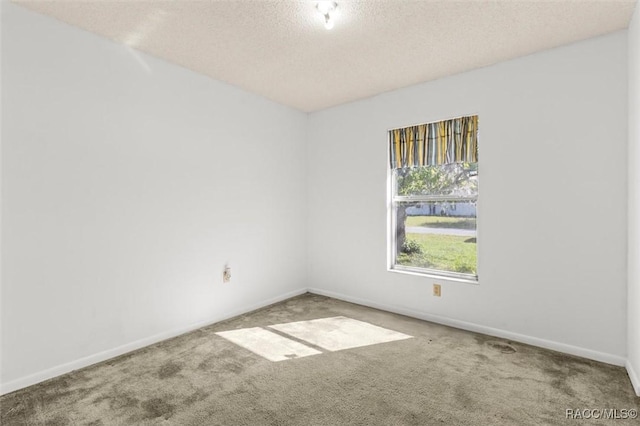 813 Constitution Blvd, Inverness, FL 34453 - unfurnished room featuring carpet flooring, a textured ceiling, and baseboards