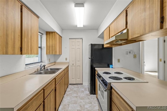 813 Constitution Blvd, Inverness, FL 34453 - kitchen with light countertops, under cabinet range hood, a sink, and electric range