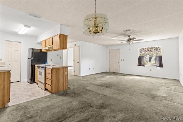 813 Constitution Blvd, Inverness, FL 34453 - kitchen featuring ceiling fan with notable chandelier, white range with electric cooktop, visible vents, light carpet, and light countertops