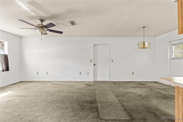 813 Constitution Blvd, Inverness, FL 34453 - unfurnished room with visible vents, a ceiling fan, carpet flooring, and a textured ceiling