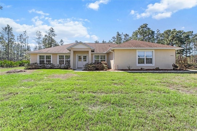 single story home featuring a front yard