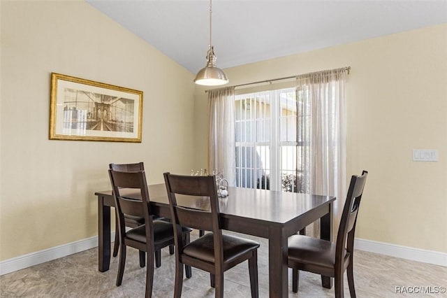 dining area with lofted ceiling