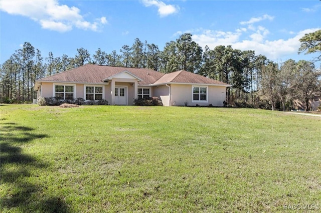 5886 W Pawnee Dr, Beverly Hills, FL 34465 - ranch-style house featuring stucco siding and a front lawn