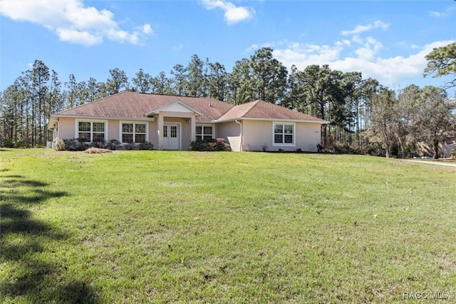 ranch-style house with a front yard