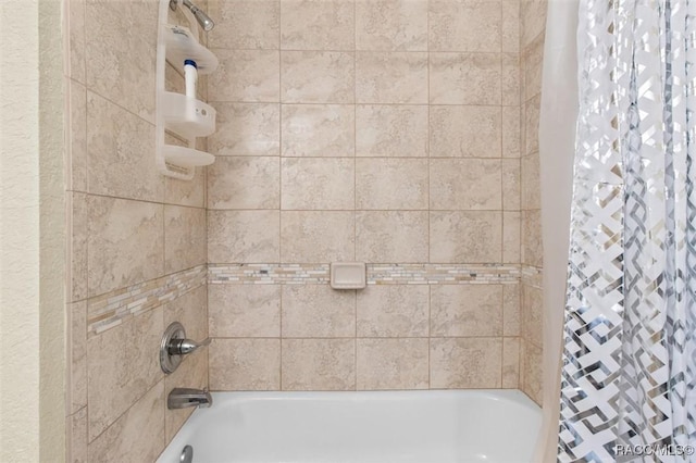 bathroom with shower / bath combo