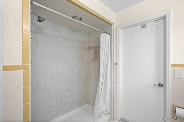 bathroom with a shower with curtain