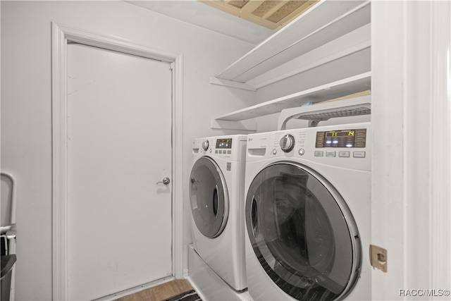 laundry area featuring independent washer and dryer