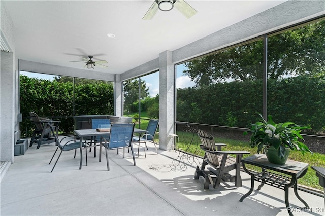 sunroom / solarium with ceiling fan