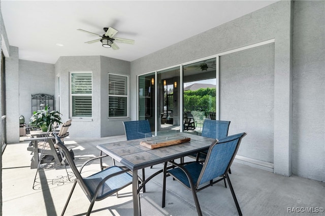 view of patio / terrace featuring ceiling fan