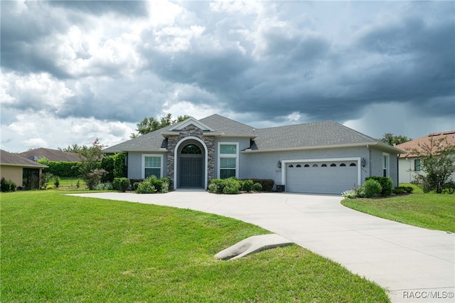 ranch-style home with a front yard and a garage