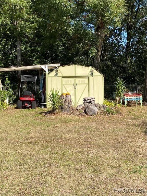 view of outdoor structure with a yard