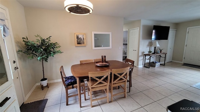 view of tiled dining space