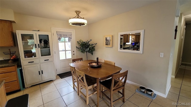 view of tiled dining space