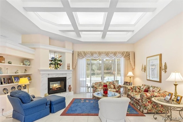 tiled living room featuring beam ceiling, coffered ceiling, and a fireplace