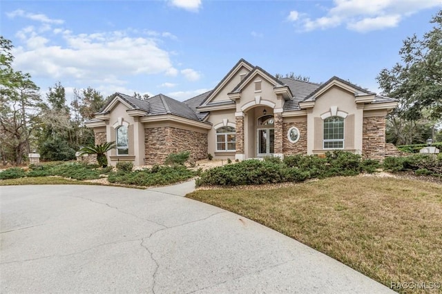 view of front of home with a front yard