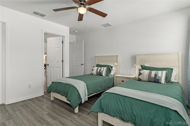 bedroom with hardwood / wood-style flooring and ceiling fan