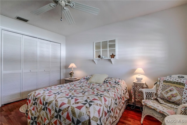 bedroom featuring a closet, ceiling fan, and dark wood-type flooring