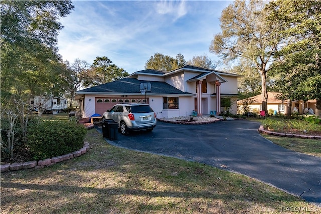 view of front of property with a garage