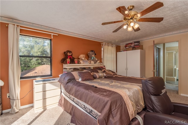 bedroom featuring ceiling fan, crown molding, light carpet, and a textured ceiling