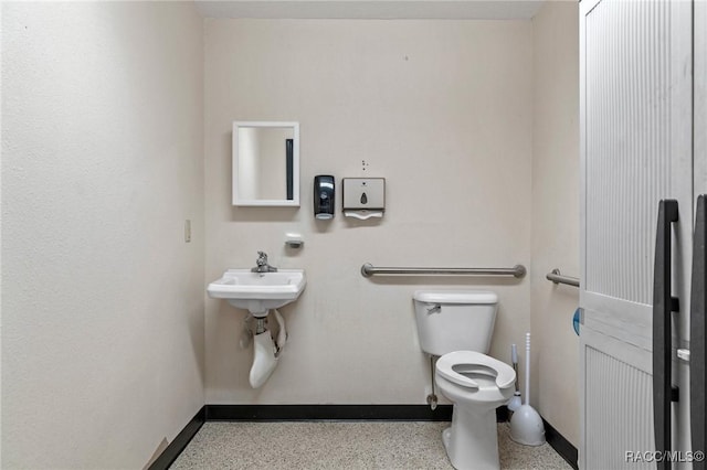 6301 E Turner Camp Rd, Inverness, FL 34453 - half bathroom featuring toilet and speckle patterned floor