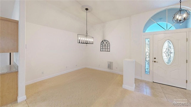 living room featuring ceiling fan and light tile patterned floors