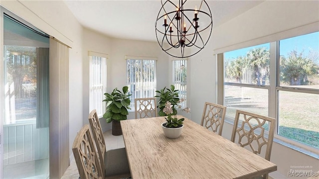 kitchen with ceiling fan, kitchen peninsula, sink, white appliances, and light brown cabinetry