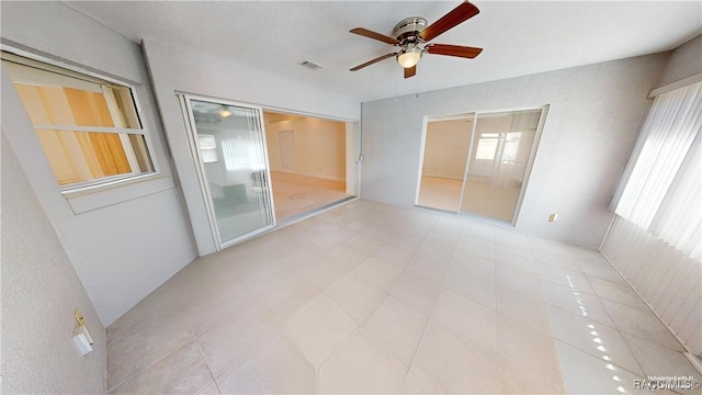 bathroom featuring a tile shower