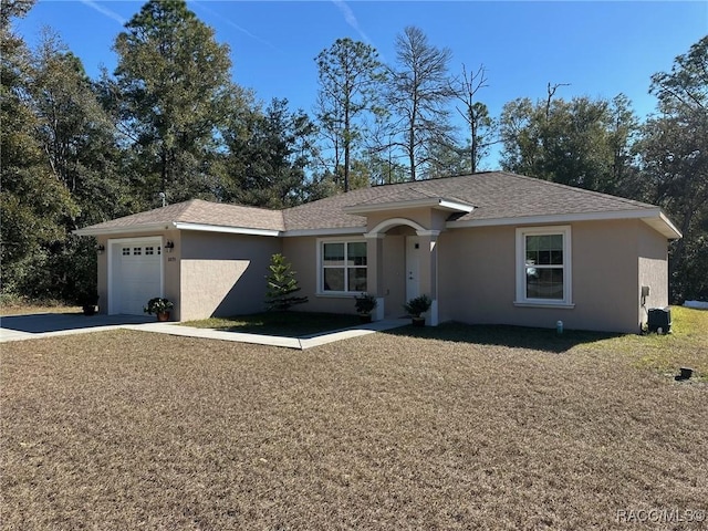 single story home featuring a garage