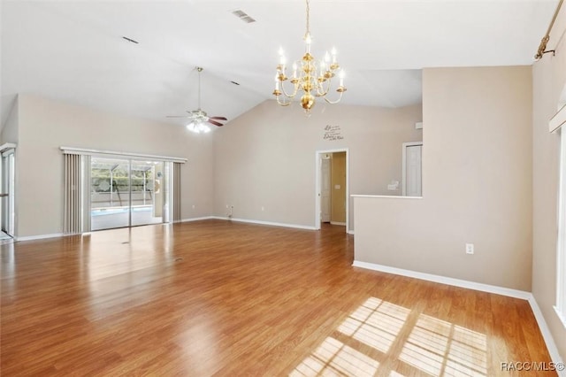 interior space with ceiling fan with notable chandelier, high vaulted ceiling, and light hardwood / wood-style floors