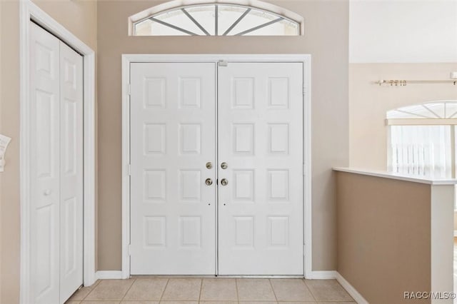 view of tiled entrance foyer