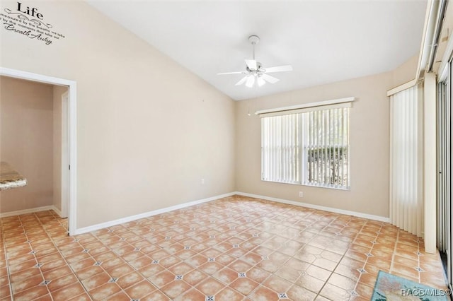 empty room featuring vaulted ceiling and ceiling fan