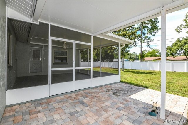 7 Michigan St, Beverly Hills, FL 34465 - unfurnished sunroom featuring ceiling fan