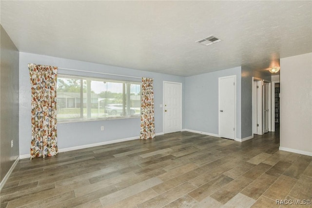7 Michigan St, Beverly Hills, FL 34465 - unfurnished room featuring wood finished floors and baseboards