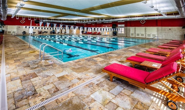 pool featuring a patio area