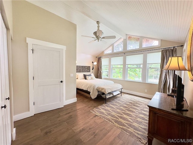 bedroom with vaulted ceiling with beams, dark hardwood / wood-style floors, and ceiling fan