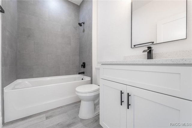 572 W Bluster Pl, Citrus Springs, FL 34434 - full bath with vanity, wood finished floors, and bathtub / shower combination
